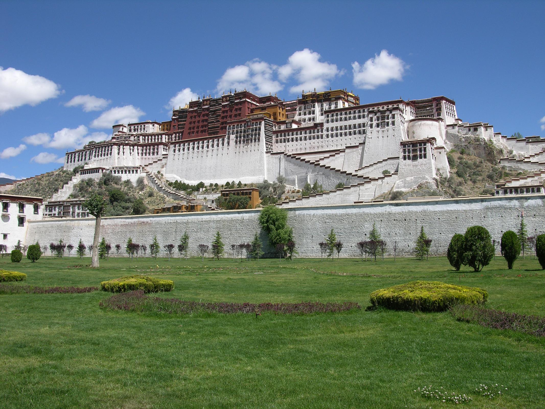 Tibet Lhasa 03 02 Potala Palace The Potala Palace, perched high above Lhasa on the Marpori (red mountain), is a place of spiritual pilgrimage and a mammoth tribute to Tibetan architectural skills. The name Potala derives from the Sanskrit Potalaa, the abode of the Bodhisattva Avalokiteshvara. Unlike most Tibetan monasteries, the Red Guards did not sack the Potala during the Cultural Revolution, and, as a result, all the chapels and their artifacts are remarkably well preserved.